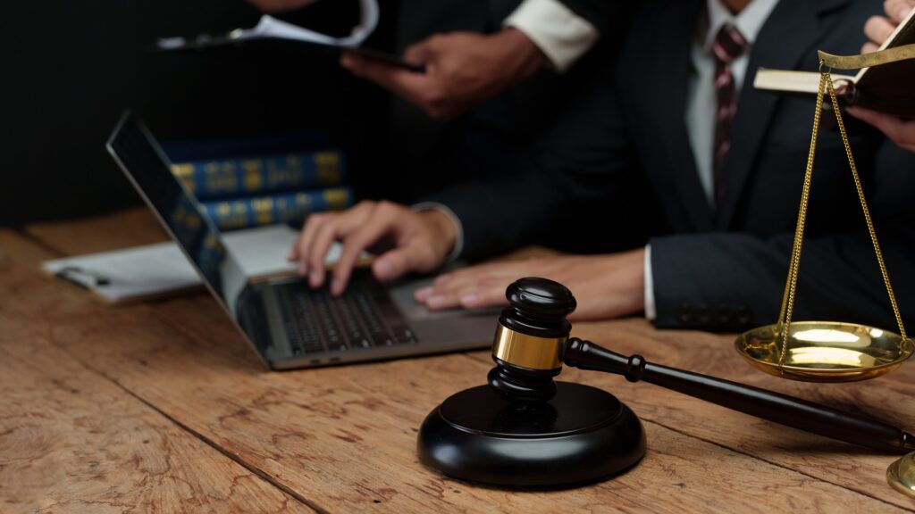Lawyer with gavel on laptop