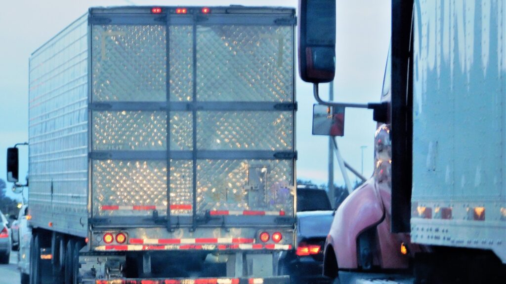 Busy highway with trucks and cars